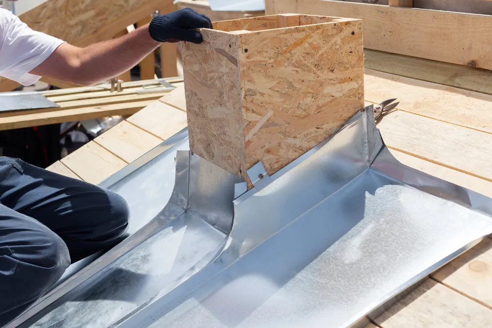 Habillage zinc d’une souche de toiture